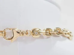 Collier maille forcat limée en chute en or jaune et diamant