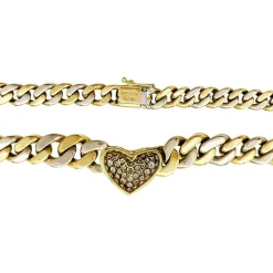 Collier maille gourmette, coeur pavé diamants.
