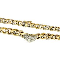 Collier maille gourmette, coeur pavé diamants.
