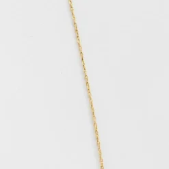 Collier négligé en or jaune, rubis synthètiques et diamants