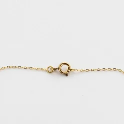 Collier négligé en or jaune, rubis synthètiques et diamants
