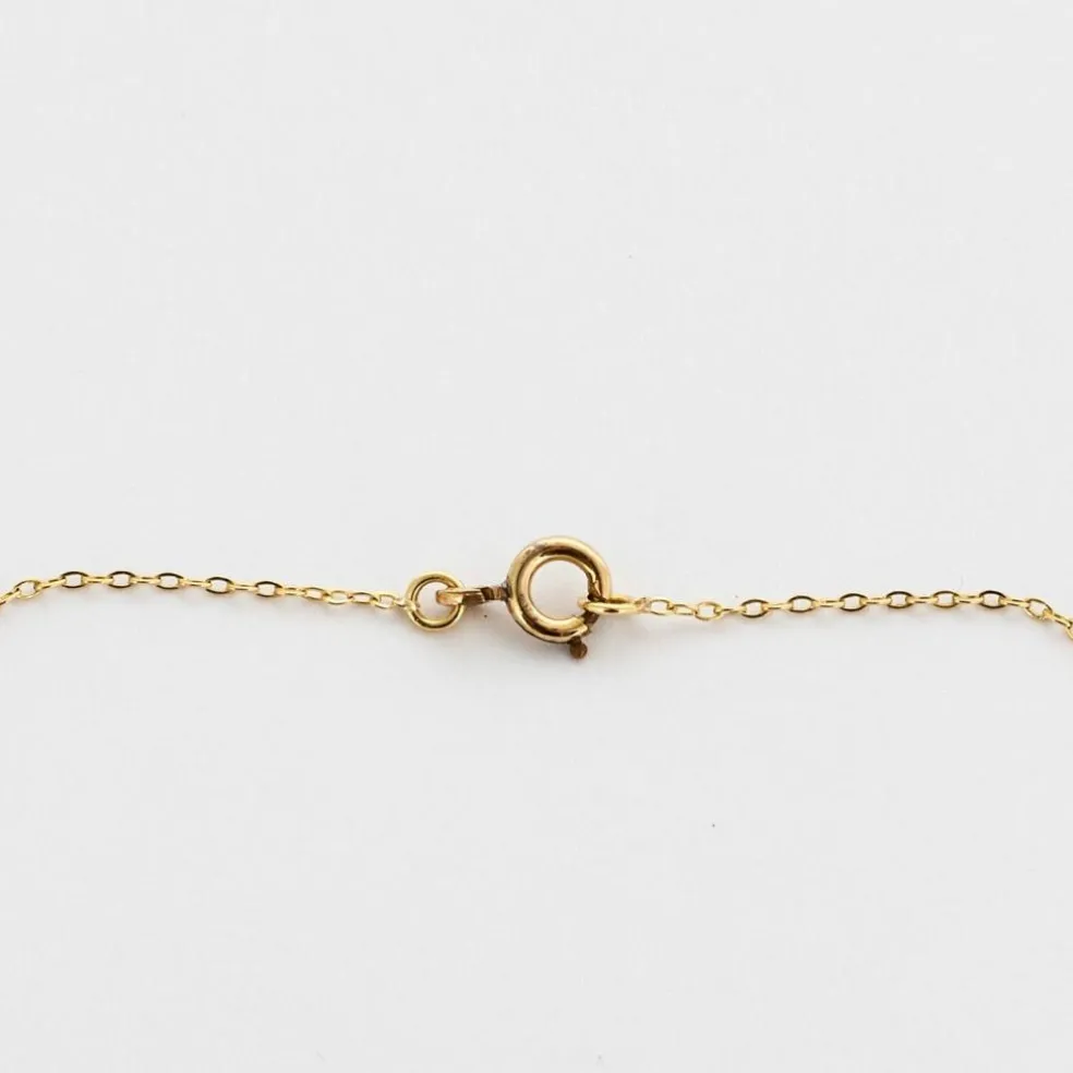 Collier négligé en or jaune, rubis synthètiques et diamants