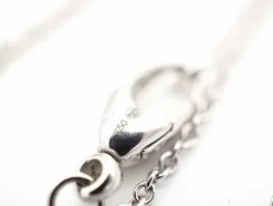 Collier or blanc avec pendentif coeur Diamants et Topaze