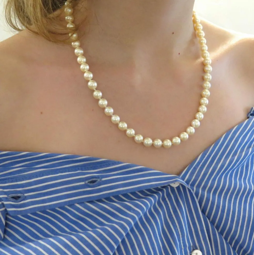 Collier or blanc en perle de culture