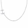 Collier or blanc et diamants.