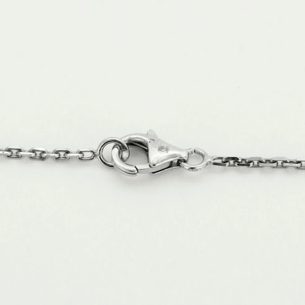 Collier or blanc, émeraude et diamants
