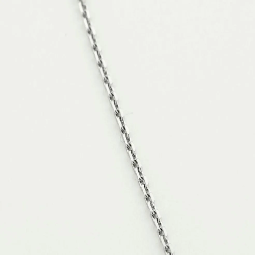 Collier or blanc, émeraude et diamants