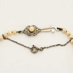 Collier or blanc perle de culture