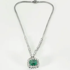Collier or gris, émeraude Colombienne et diamants