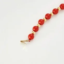 Collier or jaune billes de corail