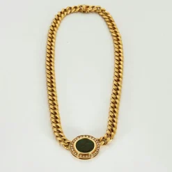 Collier or jaune diamants centré d'une pièce de bronze