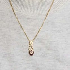 Collier or jaune diamants rubis