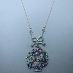 Collier or jaune et argent diamants