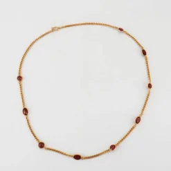 Collier or jaune et grenats