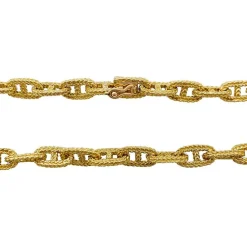 Collier or jaune, maille marine.