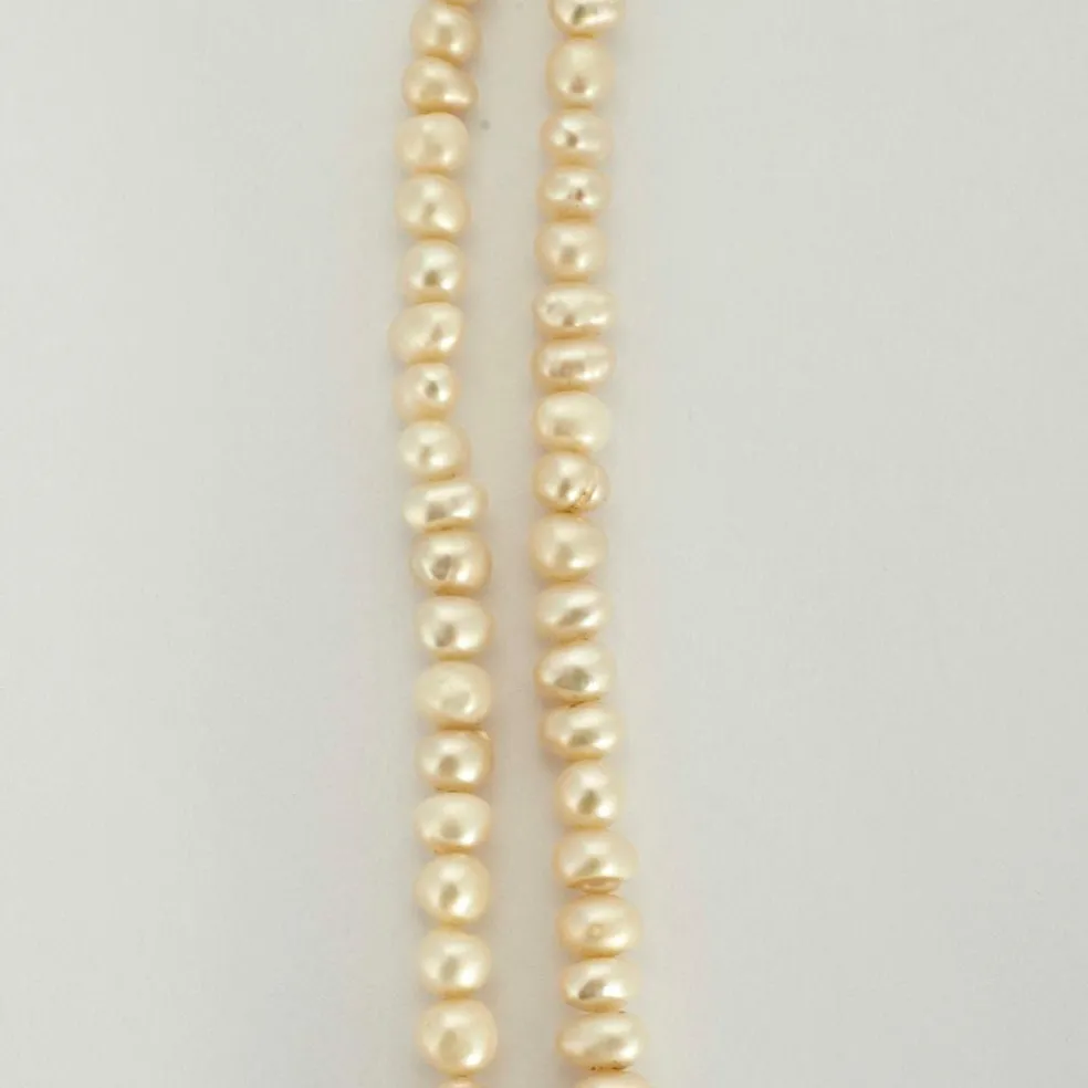 Collier or jaune perle et diamants