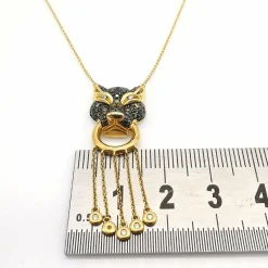 Collier or jaune saphir et diamants