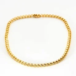 Collier or jaune texturé et diamants
