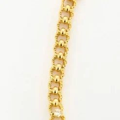 Collier or jaune texturé et diamants