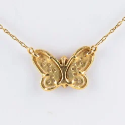 Collier papillon or jaune et diamants