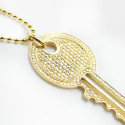 Collier pendentif clé en or et diamant
