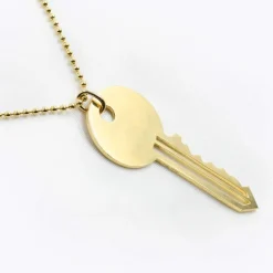 Collier pendentif clé en or et diamant