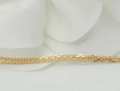 Collier pendentif en or jaune et grenats