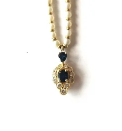 Collier perles de culture et or jaune saphirs et diamants