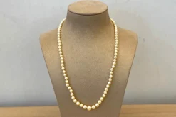 Collier perles de culture et femoir en or jaune