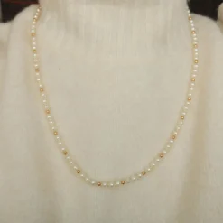 Collier perles et boules or jaune