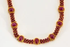 Collier Rivière Rouge or jaune, rubis