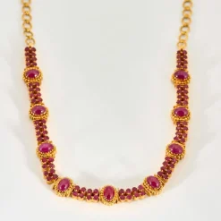 Collier Rivière Rouge or jaune, rubis