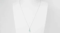 Collier solitaire or blanc et topaze bleue