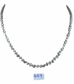 Collier tennis en or blanc serti clos et diamants mixtes