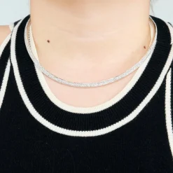 Collier torque or gris et diamants