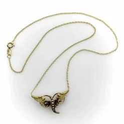 Collier victorien en or jaune avec ailes d'ange et perles de rocaille