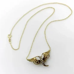 Collier victorien en or jaune avec ailes d'ange et perles de rocaille