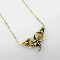 Collier victorien en or jaune avec ailes d'ange et perles de rocaille