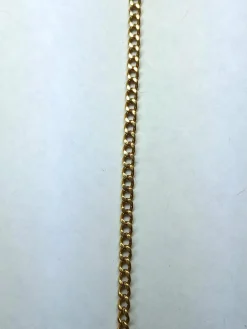 Croix et sa chaîne en or jaune 18 carats