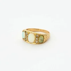 Elégante Bague Jarretière Or Jaune, Opale et Diamants