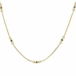 Fin collier or maille gourmette plat et ses motifs avec saphirs