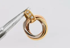 Gold diamond trio d'anneaux pendant