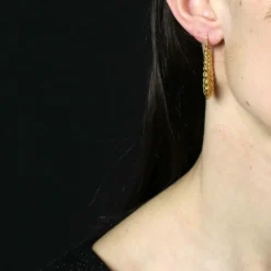 Grandes boucles d'oreilles créoles en or jaune godronné
