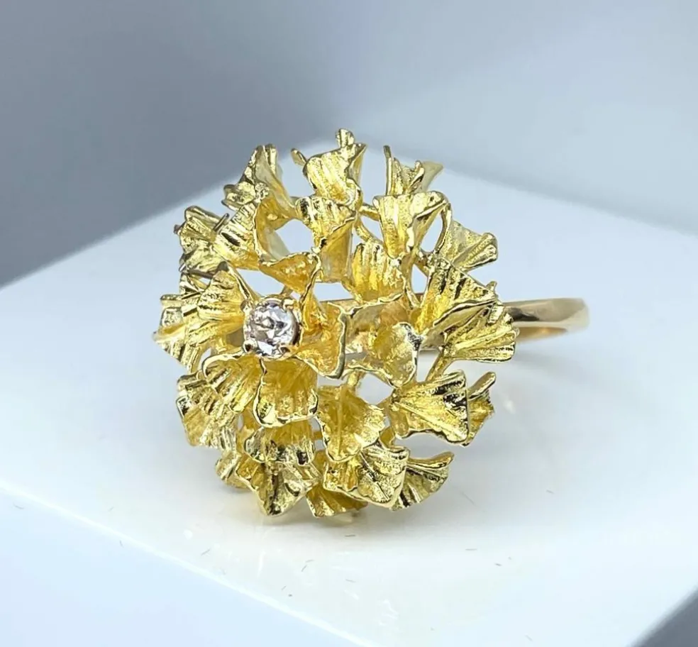 Importante bague en or jaune 18 carats et diamants