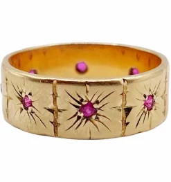 Large bague jonc Art Déco or rose, rubis sertis étoilés (circa 1950)