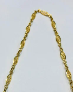 Long collier or jaune maille filigrane