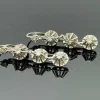 Longues dormeuses or gris serties de diamants