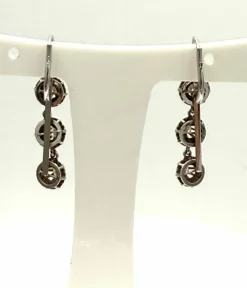 Longues dormeuses or gris serties de diamants