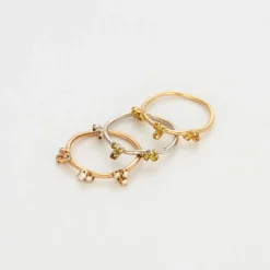 Lot de trois bagues or rose et blanc avec diamants