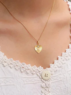Médaille amour AUGIS coeur strié Plus qu'hier moins que demain or jaune rubis